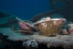 Galley items from the Hanakawa Maru, Truk Lagoon. Shot wi... by Kenneth Mostello 